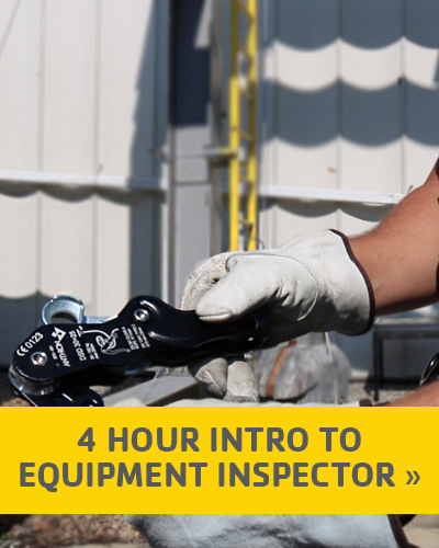 Inspecting Fall Protection Equipment With A Gloved Hand